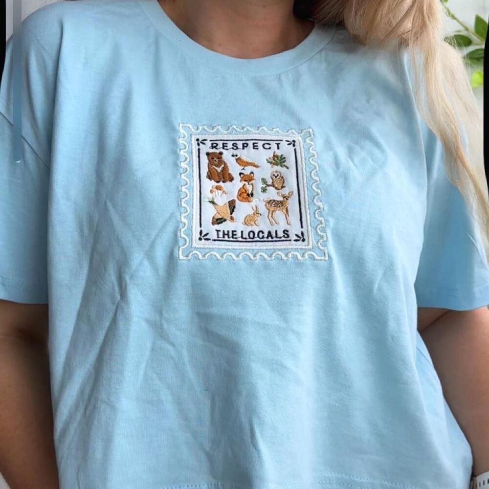 NWT 100% cotton Respect the Locals embroidered stamp baby blue cropped tee